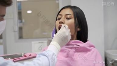 牙科病人微笑。年轻<strong>美丽</strong>的女人口腔护理病人微笑着在相机。现代口腔护理与牙科概念. 